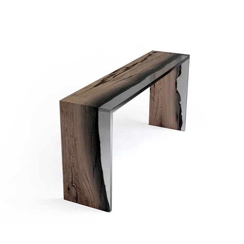 Wetland One Side Console highlights raw wood framed in crystal-clear resin. Its elongated form and asymmetrical detailing balance organic beauty with sharp contemporary lines.