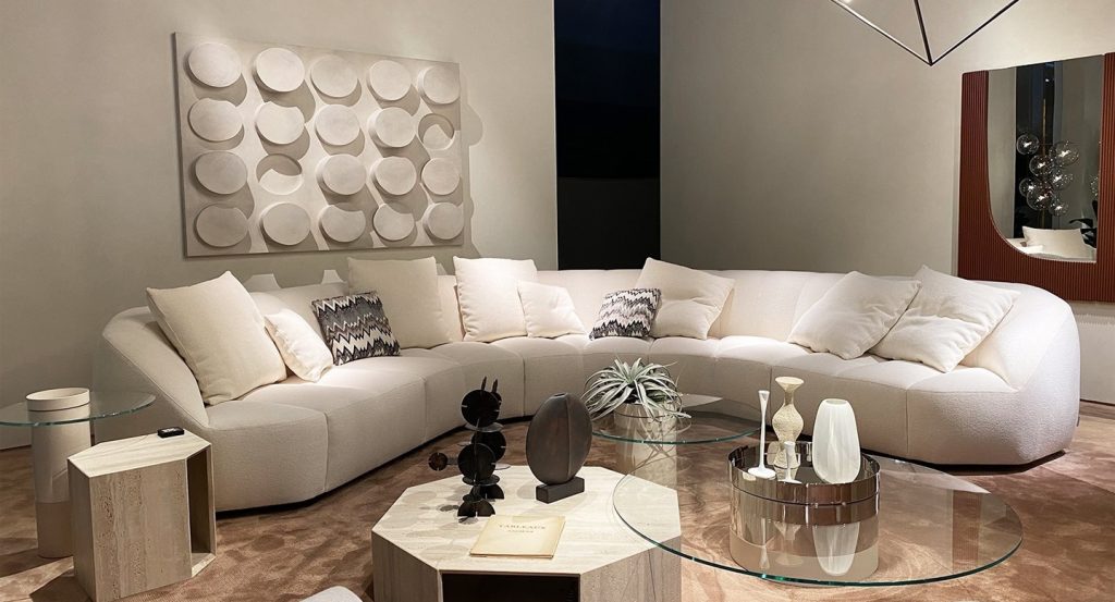 sofa made with a wooden base, polyurethane foam and fabric in a white tone in a background room